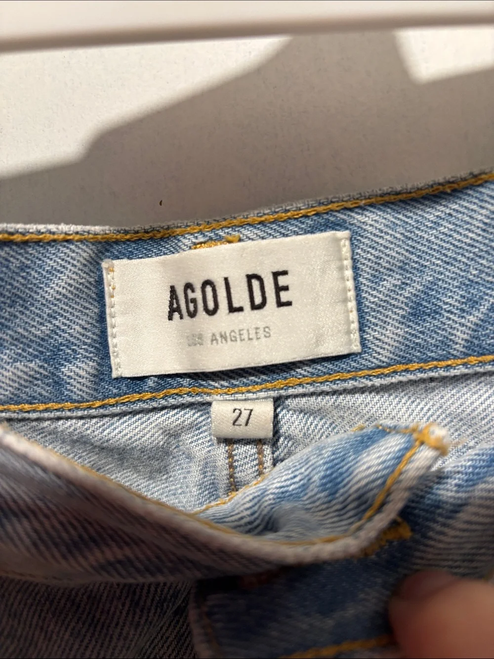 AGOLDE Parker distressed long denim shorts